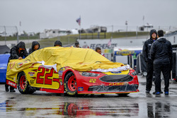 The car of Joey Logano, Team Penske, Ford Fusion Shell Pennzoil pushed in the garage area under the rain