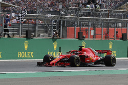 Race winner Sebastian Vettel, Ferrari SF71H takes the chequered flag