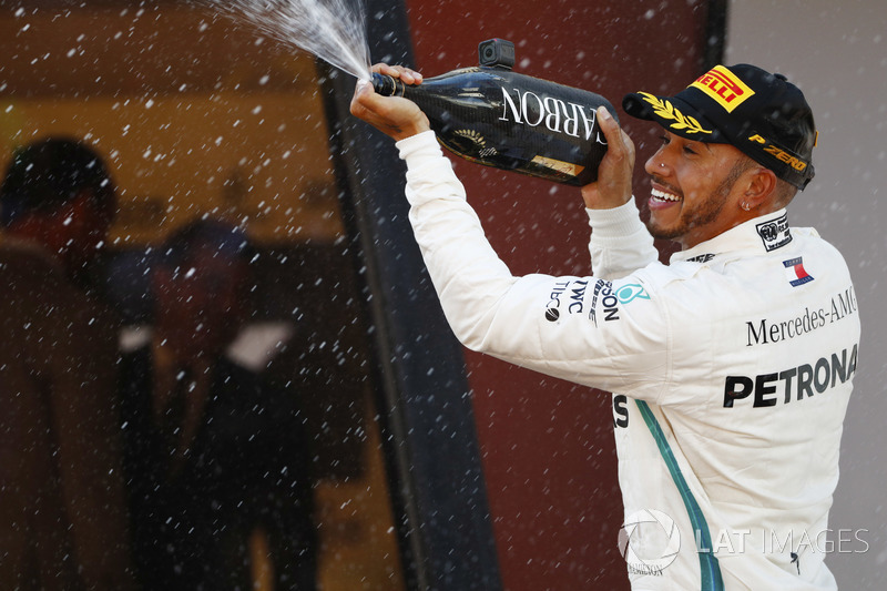 Victor Lewis Hamilton, Mercedes AMG F1, sprays champagne on the podium