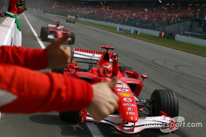 1. Michael Schumacher, Ferrari, 2. Felipe Massa, Ferrari