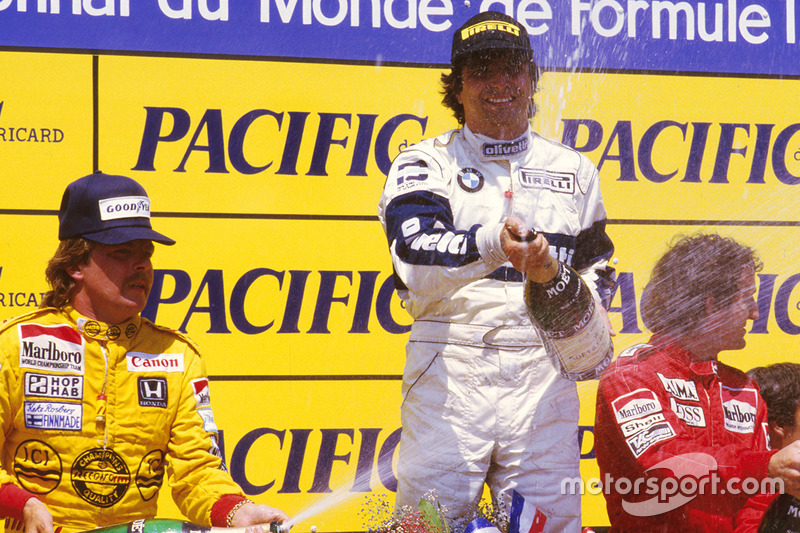 Podium: race winner Nelson Piquet, Brabham BMW, second place Keke Rosberg, Williams Honda, third pla