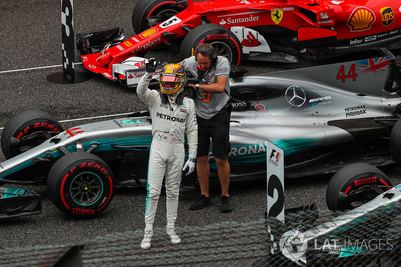 Pole sitter Lewis Hamilton, Mercedes AMG F1 celebrates in parc ferme