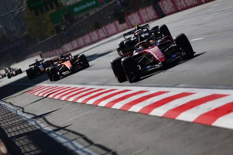 Charles Leclerc, Ferrari, Lando Norris, McLaren, Isack Hadjar, Red Bull Racing