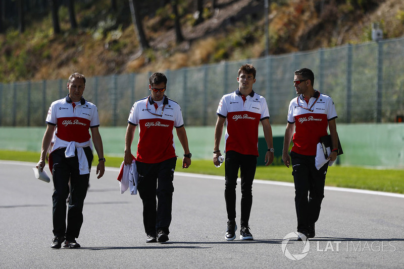 Charles Leclerc, Sauber, walks the circuit with colleagues
