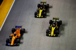 Fernando Alonso, McLaren MCL33, leads Carlos Sainz Jr., Renault Sport F1 Team R.S. 18, and Nico Hulkenberg, Renault Sport F1 Team R.S. 18
