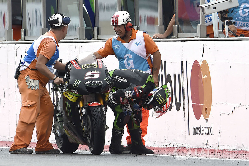 Johann Zarco, Monster Yamaha Tech 3 pushes his bike over the finish line