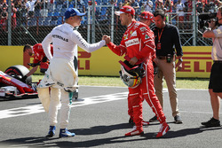 Il terzo qualificato Valtteri Bottas, Mercedes AMG F1, il secondo qualificato Kimi Raikkonen, Ferrar