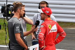 Sebastian Vettel, Ferrari talks with Jenson Button, in parc ferme
