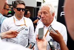 Charlie Whiting talks to the media