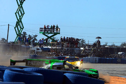 #2 Tequila Patron ESM Nissan DPi, P: Scott Sharp, Ryan Dalziel, Olivier Pla slides wide in turn 1 at the start of the race