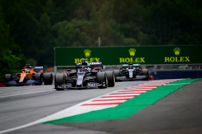 Yuki Tsunoda, AlphaTauri AT02, Daniel Ricciardo, McLaren MCL35M, Lance Stroll, Aston Martin AMR21