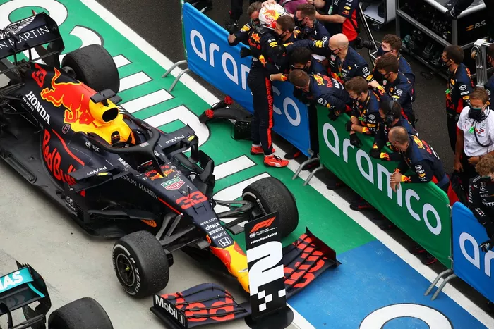 Max Verstappen,  Red Bull Racing celebrates with team members in parc ferme