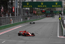 Sebastian Vettel, Ferrari SF71H leads Lewis Hamilton, Mercedes-AMG F1 W09 EQ Power+
