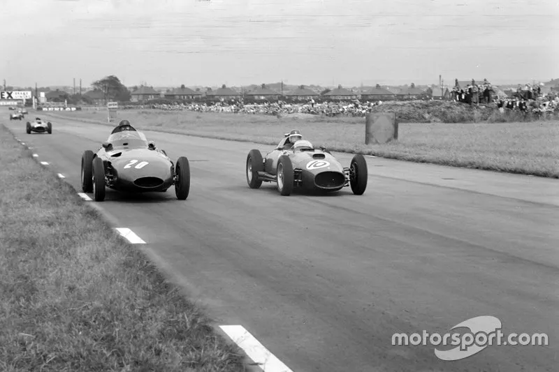 Tony Brooks, Vanwall; Stirling Moss, Vanwall et Mike Hawthorn, Ferrari