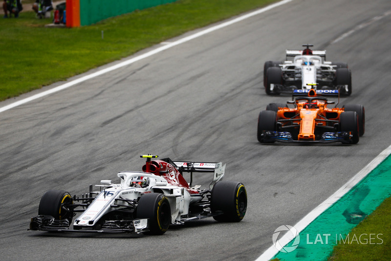 Charles Leclerc, Sauber C37, leads Stoffel Vandoorne, McLaren MCL33, and Marcus Ericsson, Sauber C37