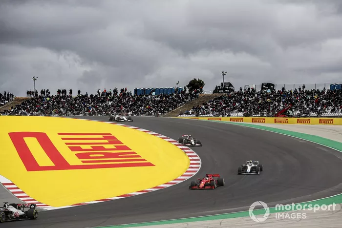 Romain Grosjean, Haas VF-20, Sebastian Vettel, Ferrari SF1000, Nicholas Latifi, Williams FW43, and Kevin Magnussen, Haas VF-20