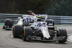 Sergey Sirotkin, Williams FW41, leads Marcus Ericsson, Sauber C37