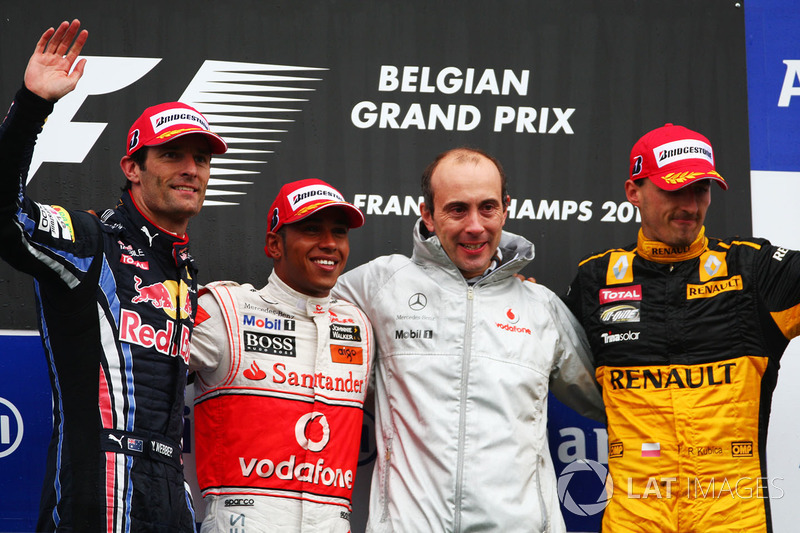 Podium: Mark Webber, Red Bull Racing, Lewis Hamilton, McLaren, Phil Prew, McLaren Race Engineer and Robert Kubica, Renault