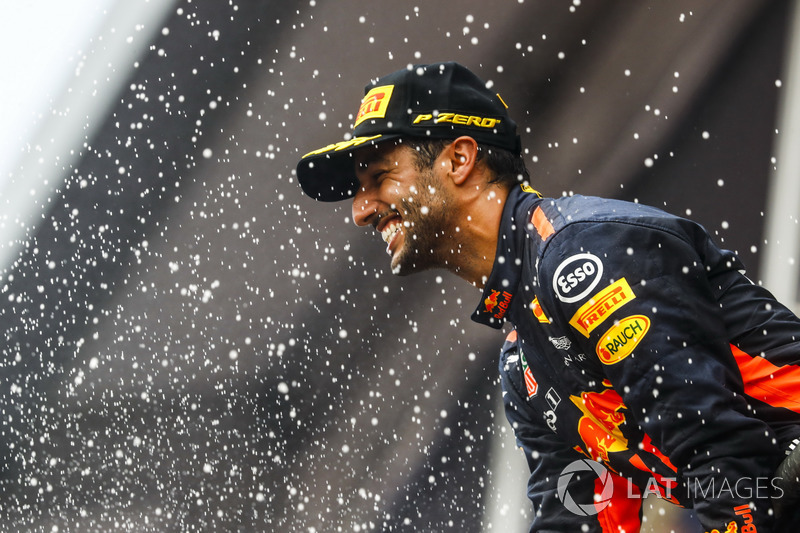 Third place Daniel Ricciardo, Red Bull Racing, sprays Champagne on the podium