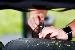 A Pirelli engineer records some tyre data