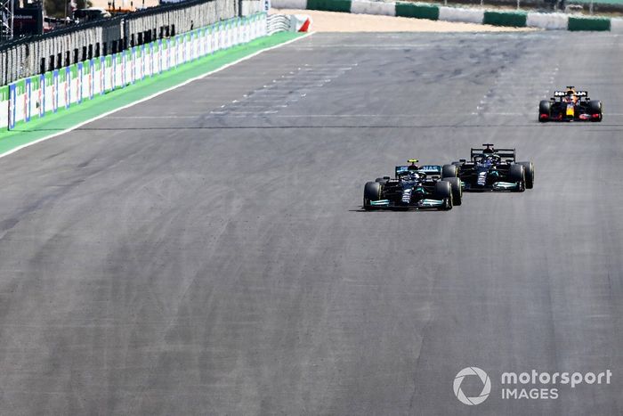 Lewis Hamilton, Mercedes W12, battles with Valtteri Bottas, Mercedes W12