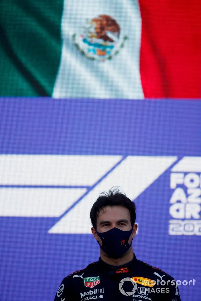 Podio: ganador de la carrera Sergio Pérez, Red Bull Racing