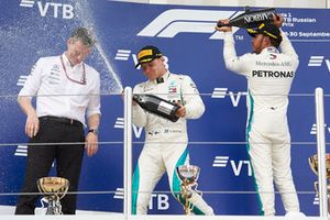 James Allison, Mercedes AMG F1 Technical Director, Valtteri Bottas, Mercedes AMG F1, Lewis Hamilton, Mercedes AMG F1 and celebrate on the podium with the champagne