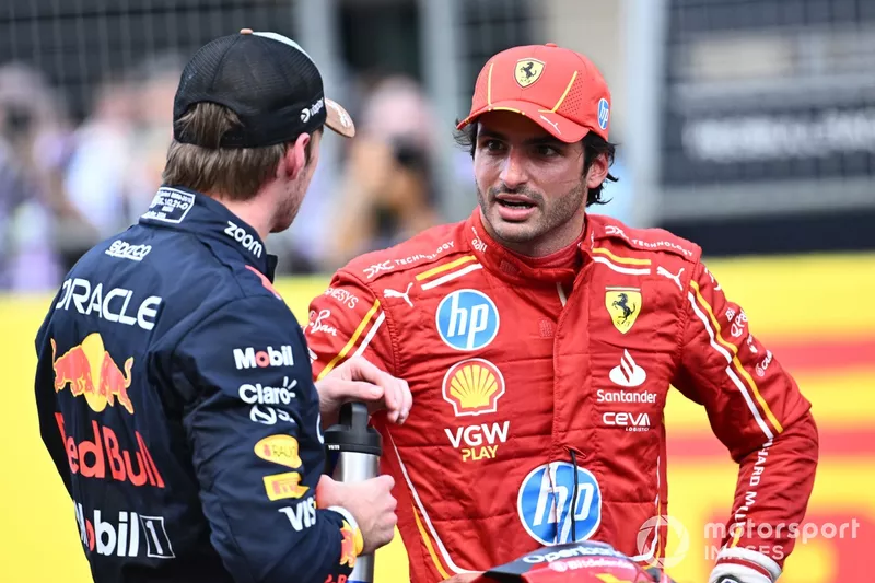 Max Verstappen, Red Bull Racing, 1st position, Carlos Sainz, Scuderia Ferrari, 2nd position, chat in Parc Ferme 