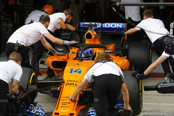 Fernando Alonso, McLaren MCL33, is returned to the McLaren garage