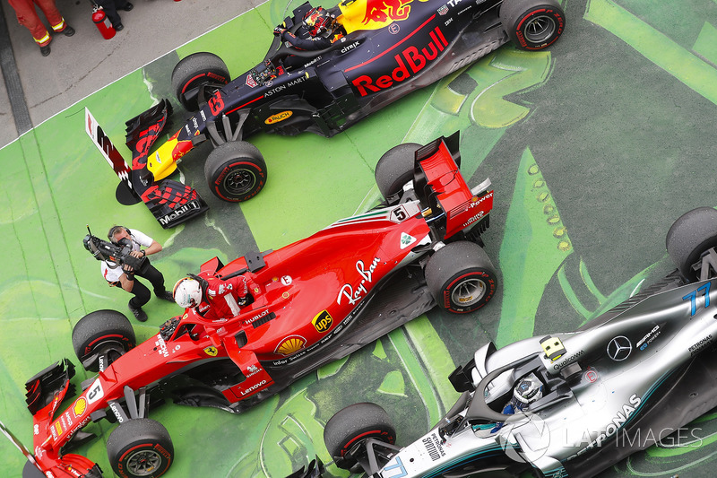 Sebastian Vettel, Ferrari, celebrates victory in parc ferme