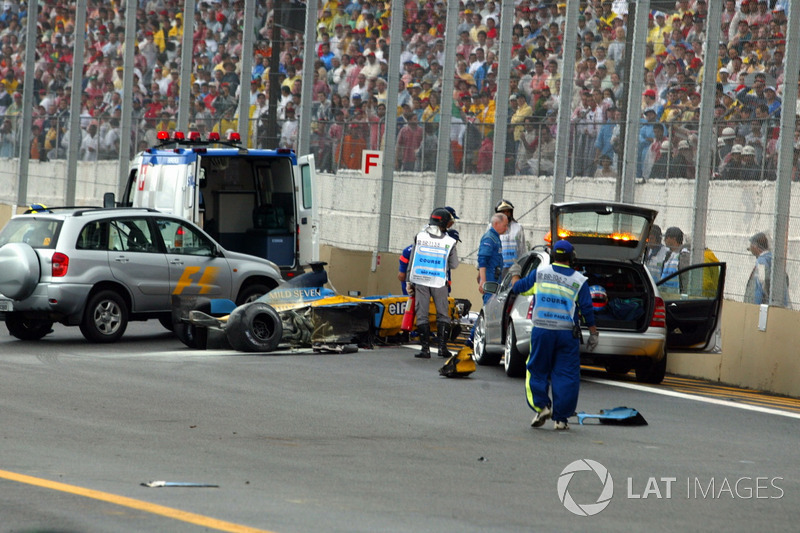 Fernando Alonso, Renault F1 Team is stretchered away from the circuit