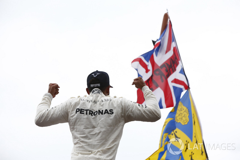 Race winner Lewis Hamilton, Mercedes AMG F1, celebrates with the fans