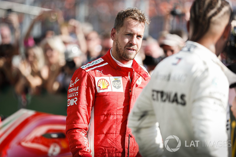 Sebastian Vettel, Ferrari dan Lewis Hamilton, Mercedes AMG F1