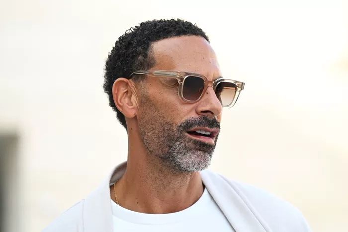 Rio Ferdinand arrives in the Paddock