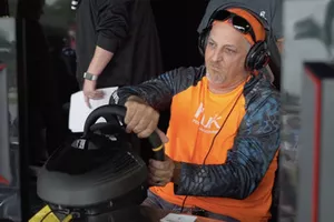 A competitor plays NASCAR Heat 3
