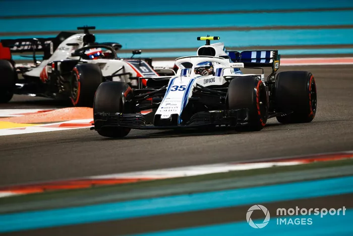 Sergey Sirotkin, Williams FW41 y Romain Grosjean, Haas F1 Team VF-18 