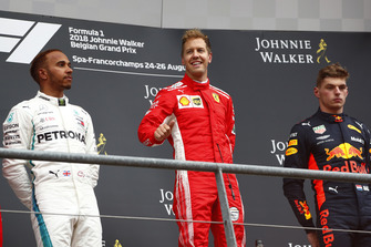 Race winner Sebastian Vettel, Ferrari, second place Lewis Hamilton, Mercedes AMG F1, third place Max Verstappen, Red Bull Racing