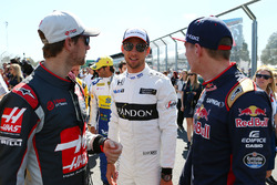 Romain Grosjean, Haas F1 Team with Jenson Button, McLaren
