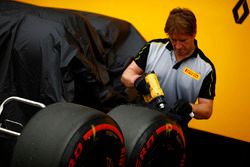 A Pirelli engineer works on some Super Soft tyres