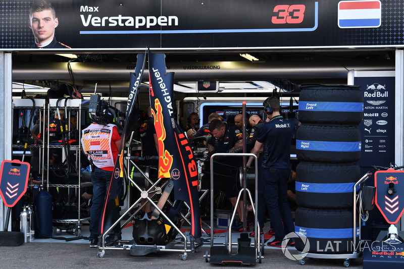 Red Bull Racing mechanics work on the car of Max Verstappen, Red Bull Racing RB14