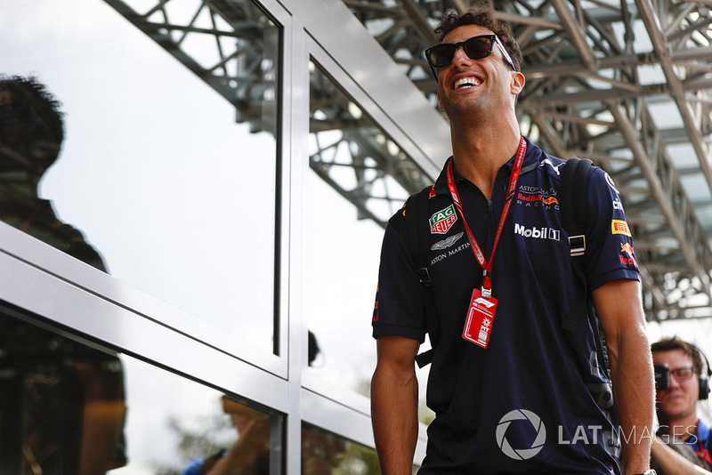 Daniel Ricciardo, Red Bull Racing, arrives in the paddock in good spirits