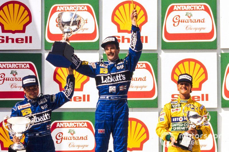 Podium: second place Riccardo Patrese, Willams, Race winner Nigel Mansell, Williams, third place Michael Schumacher, Benetton