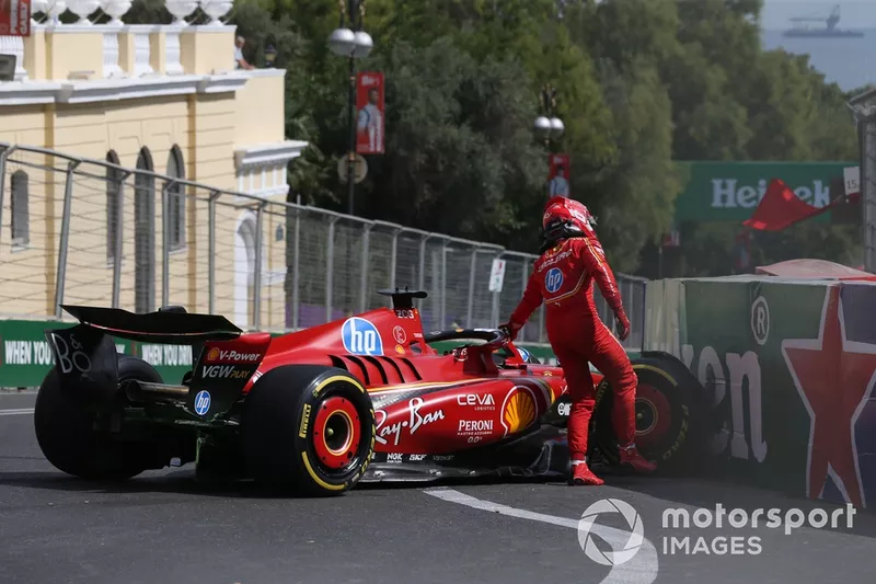 Charles Leclerc, Ferrari SF-24, walks away from the car after crashing into the barrier