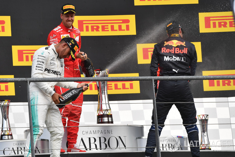 Lewis Hamilton, Mercedes AMG F1, Sebastian Vettel, Ferrari and Daniel Ricciardo, Red Bull Racing celebrate on the podium