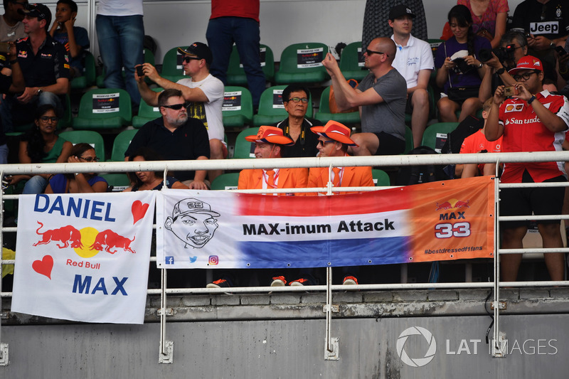 Max Verstappen, Red Bull Racing fans and banners