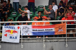 Max Verstappen, Red Bull Racing fans and banners