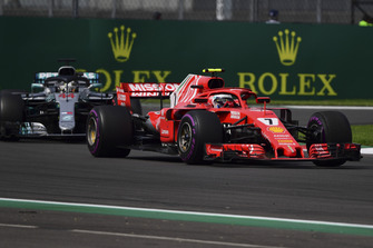 Kimi Raikkonen, Ferrari SF71H leads Lewis Hamilton, Mercedes AMG F1 W09 EQ Power+