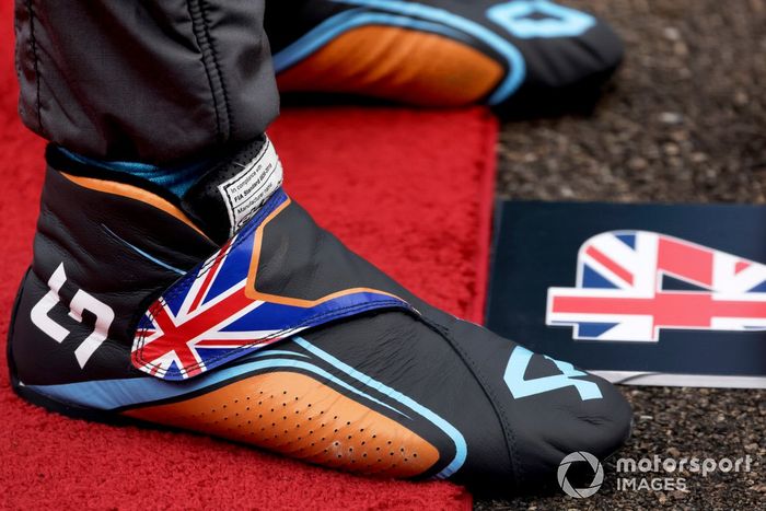 Las botas de Lando Norris, McLaren, en la parrilla