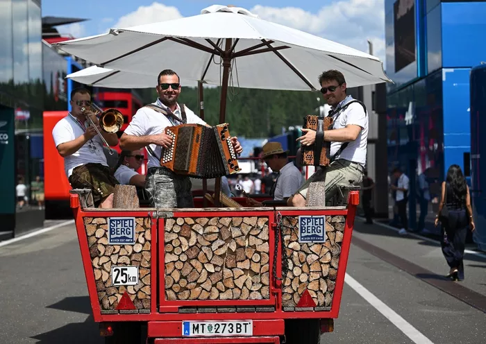 Musicians play in the Paddock