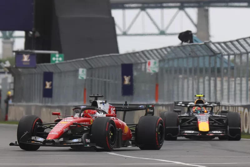 Charles Leclerc, Ferrari; Isack Hadjar, Red Bull Racing